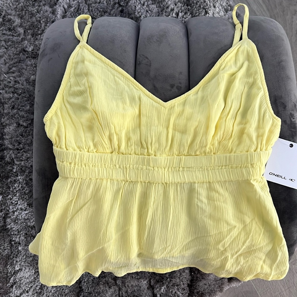 NWT O’Neill Flowy Top. Butter Yellow. Size S. Perfect top for Summer & Travel.